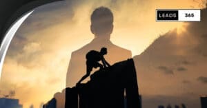 Silhouetted climber inside businessman's silhouette, concept for leadership success.
